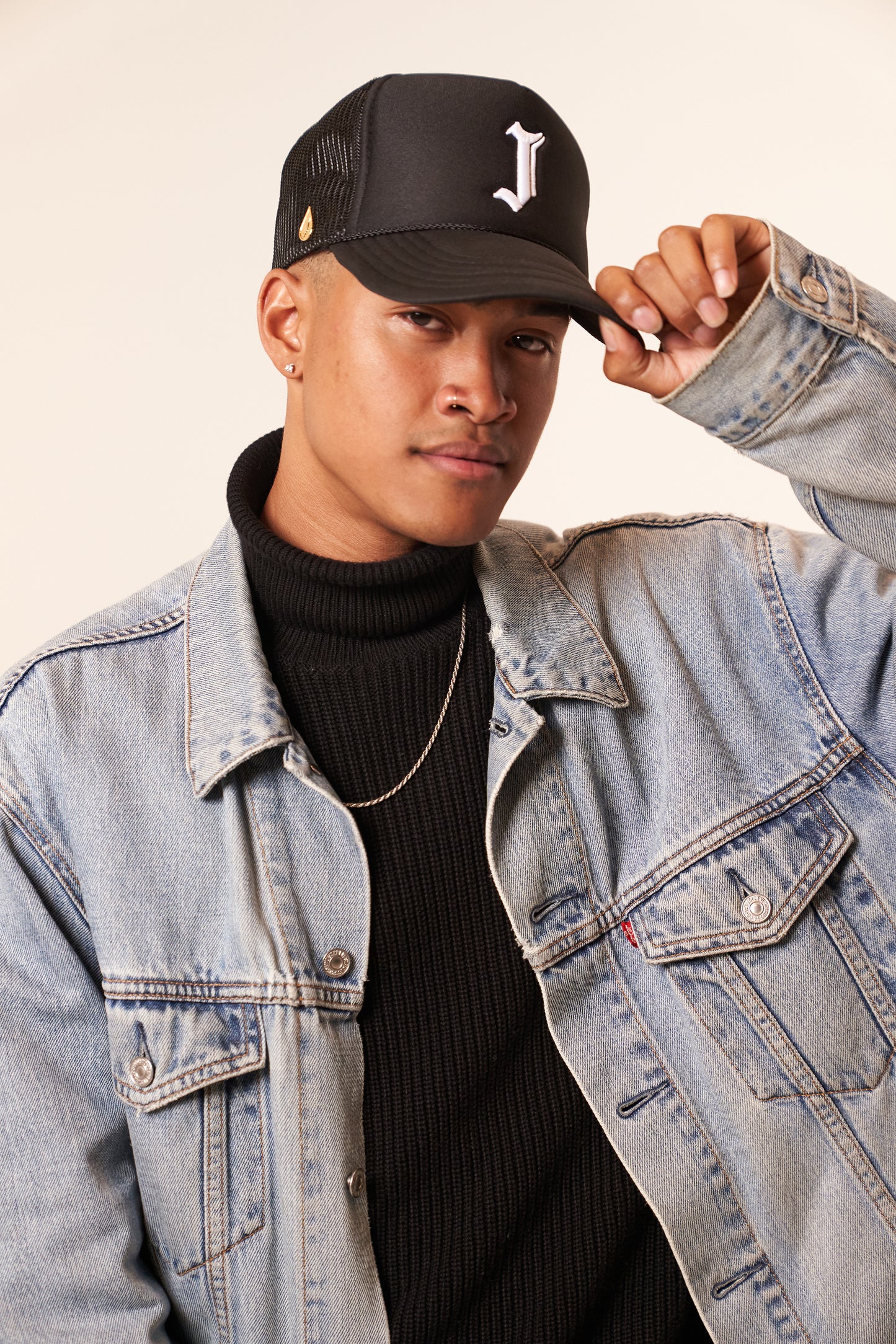 Gold Jrip Pin on Hat