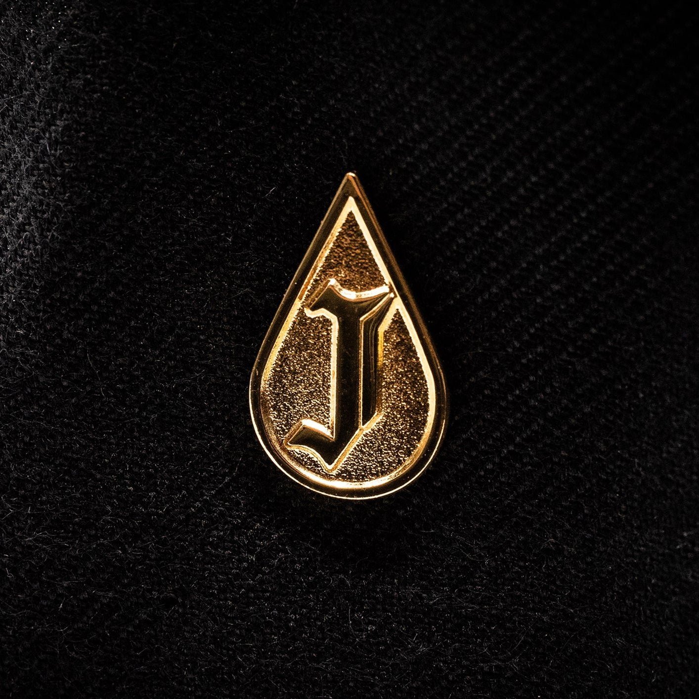 Gold Jrip Pin Close-up