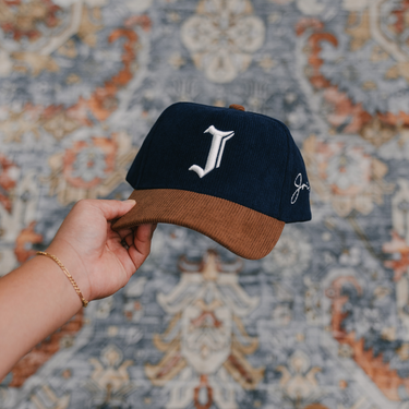 "J" Signature Snapback Hat (NAVY/BROWN CORDUROY)